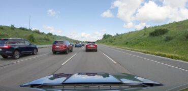 A view of the space between vehicles when vehicles are not using Ford’s adaptive cruise control technology, relying instead on driver reactions to vehicle movements around them.